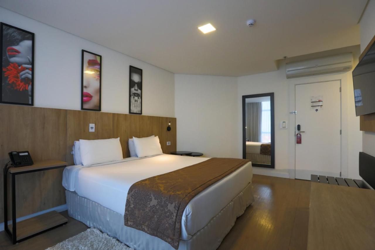 Quarto com Cama Queen-size