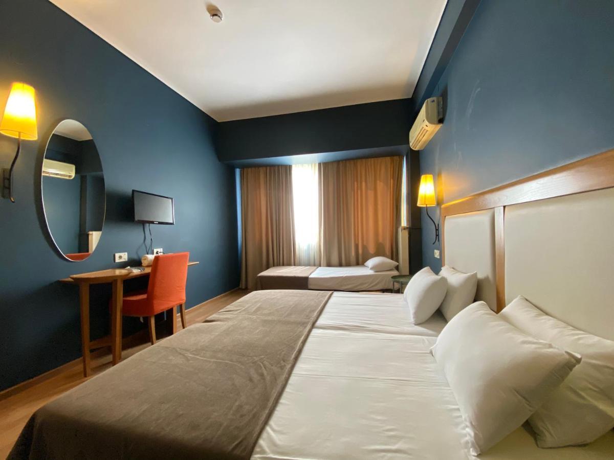 Chambre Triple (2 Adultes & 1 Enfant)