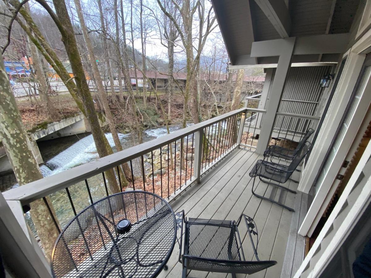 One Bedroom Cottages Kitchen Fireplace & Private Balcony on stream