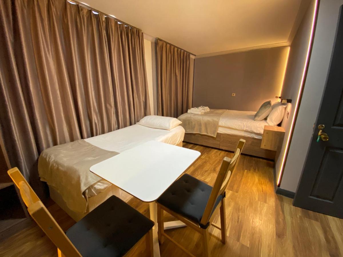 Camera Familiare con Bagno in Comune