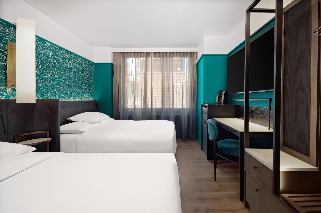 Kamer met 2 Queensize Bedden - Hoge Verdieping