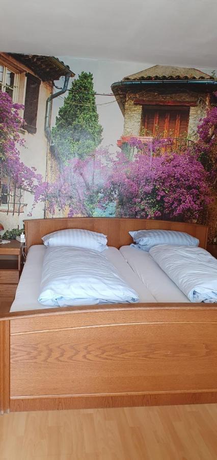 Dreibettzimmer mit Balkon