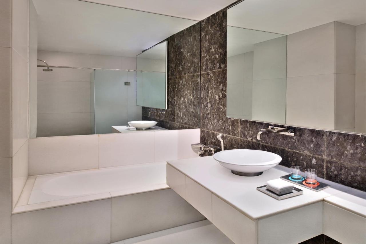 Luxury Suite 2 way Airport Transfer Access to club lounge including Hi-Tea from 3-5 pm Happy Hours from 6-8 pm