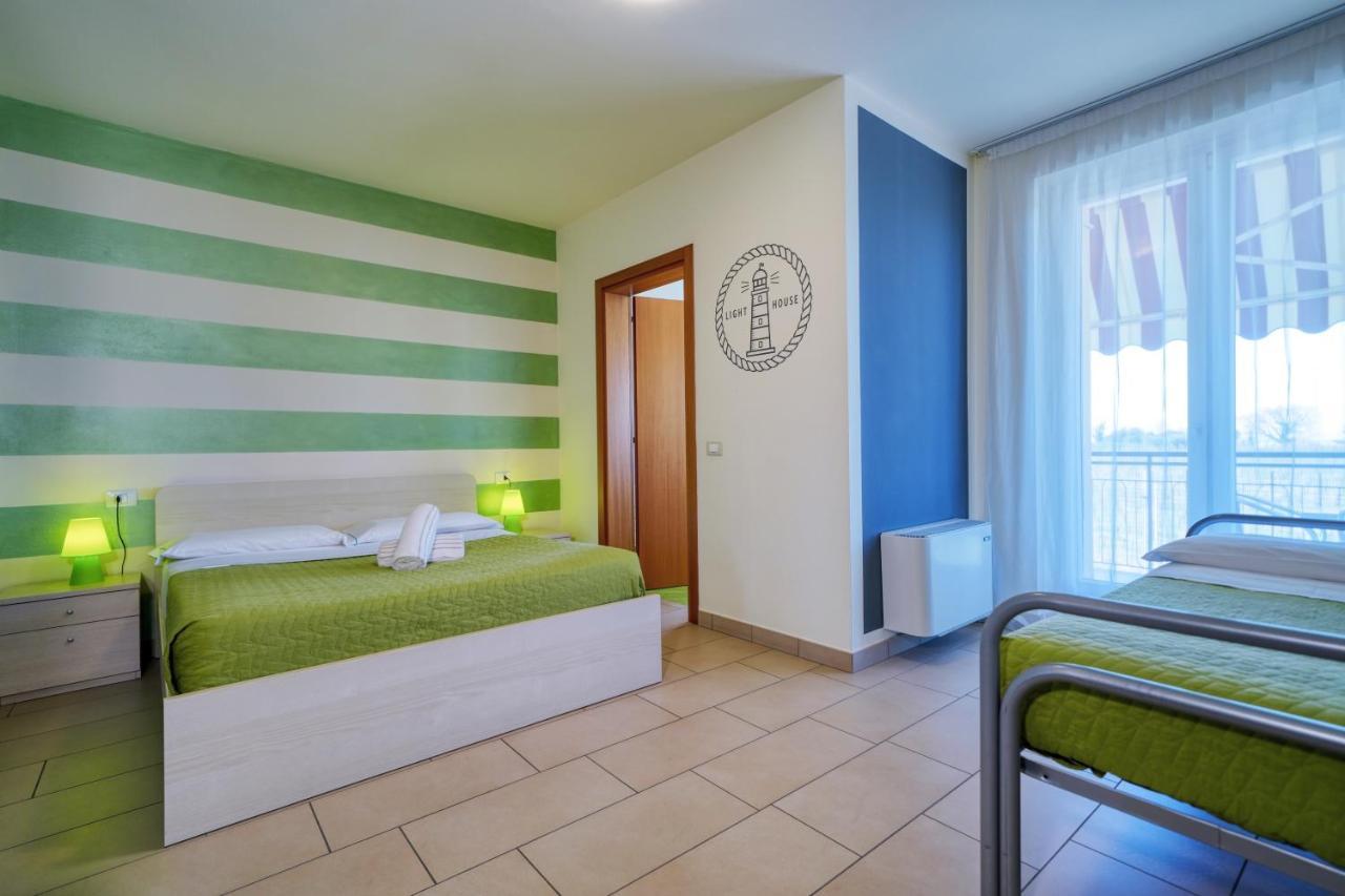 Triple Room Balcony Partial Lake View,848856143:JPEG