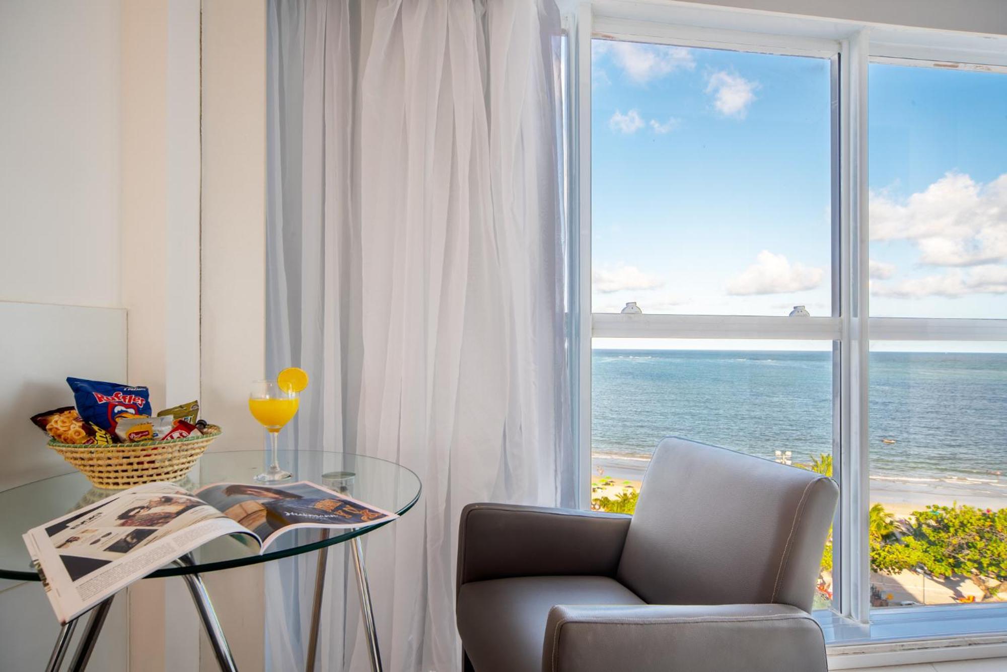 Quarto com cama casal Frente mar