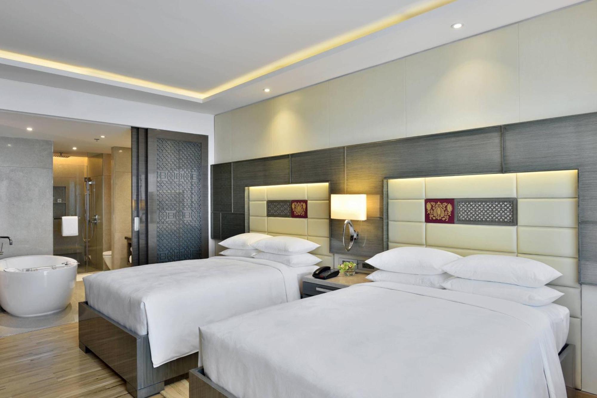 Guest Room Executive lounge access 2 Double Pool View & complimentary one-way airport transfer BOM T1 & T2,1407198527:JPEG