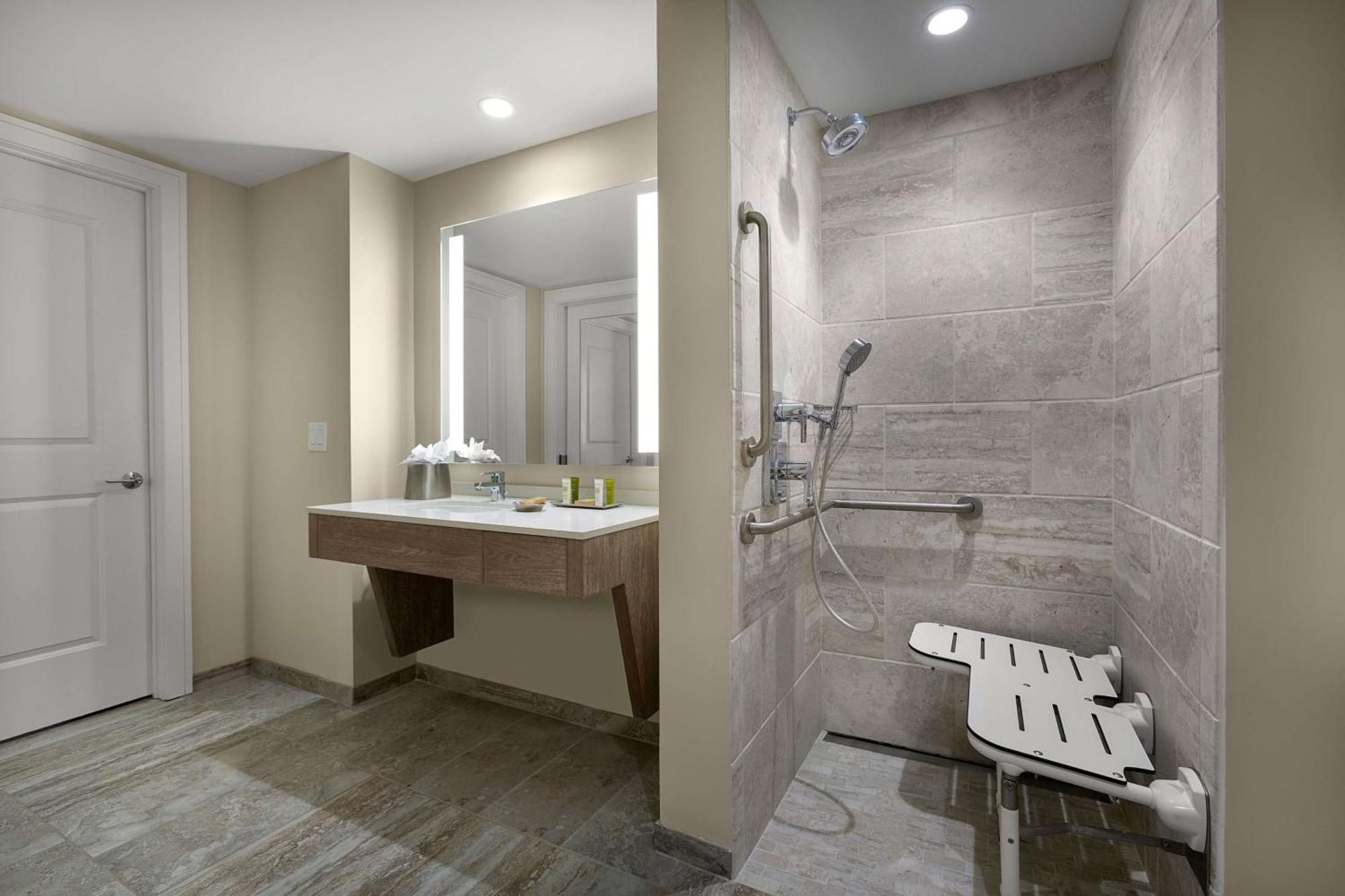 Two-Bedroom Suite with One King Bed, Two Double Beds and Roll-in Shower - Accessible,1551653374:JPEG