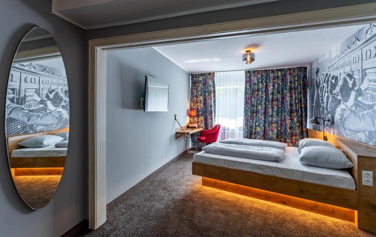 Doppelzimmer „Comfy Maxy" zum Teil mit Balkon