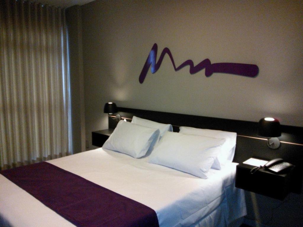 Quarto Duplo com Cama de Casal