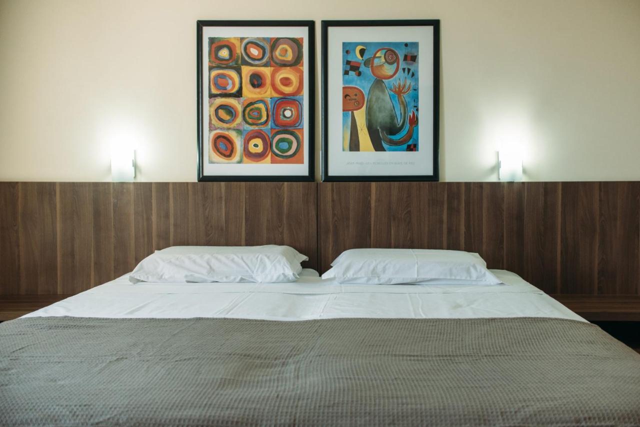 Quarto Deluxe com Cama de Casal ou 2 de Solteiro
