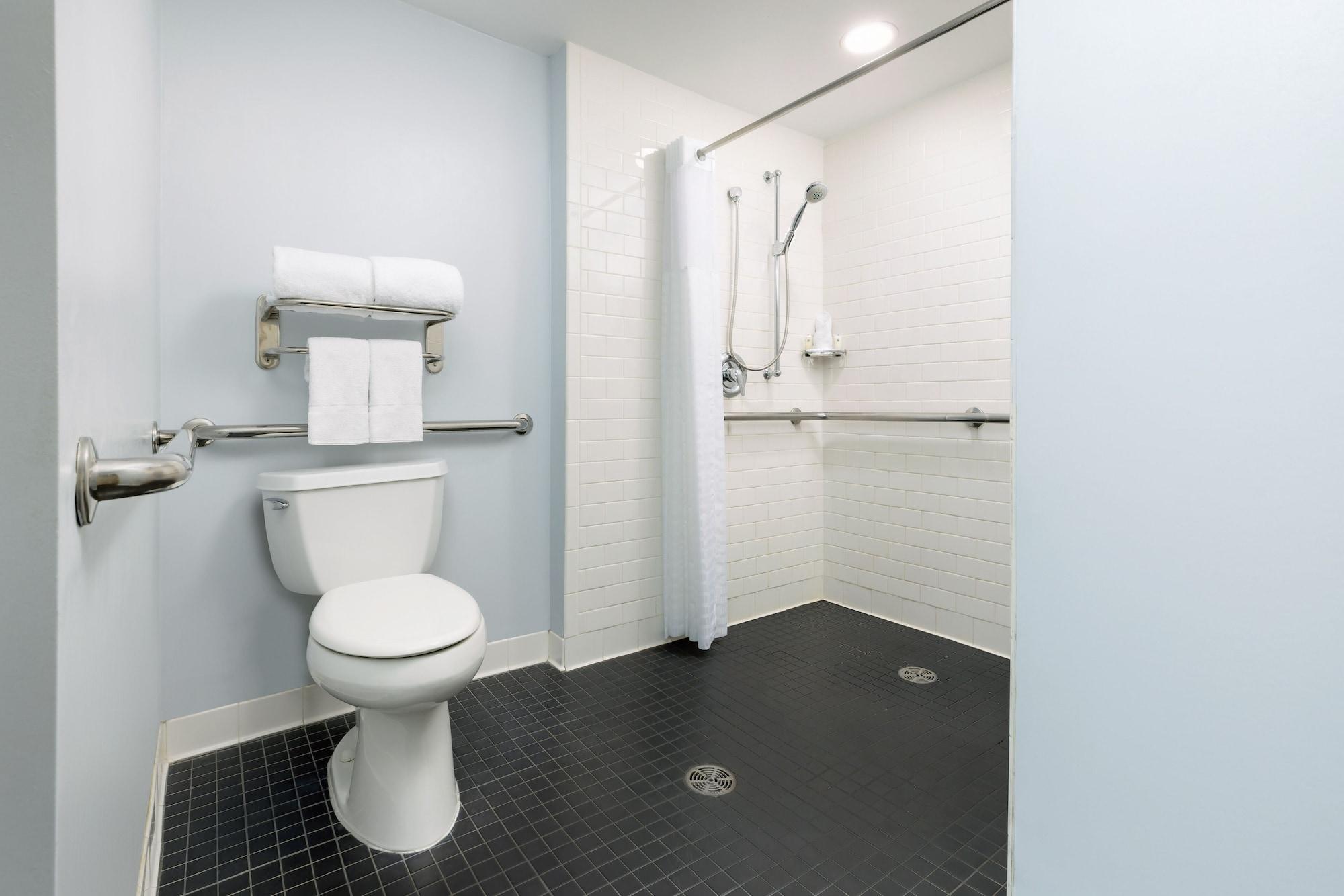 Queen Room Roll Shower Hearing or Mobility Accessible