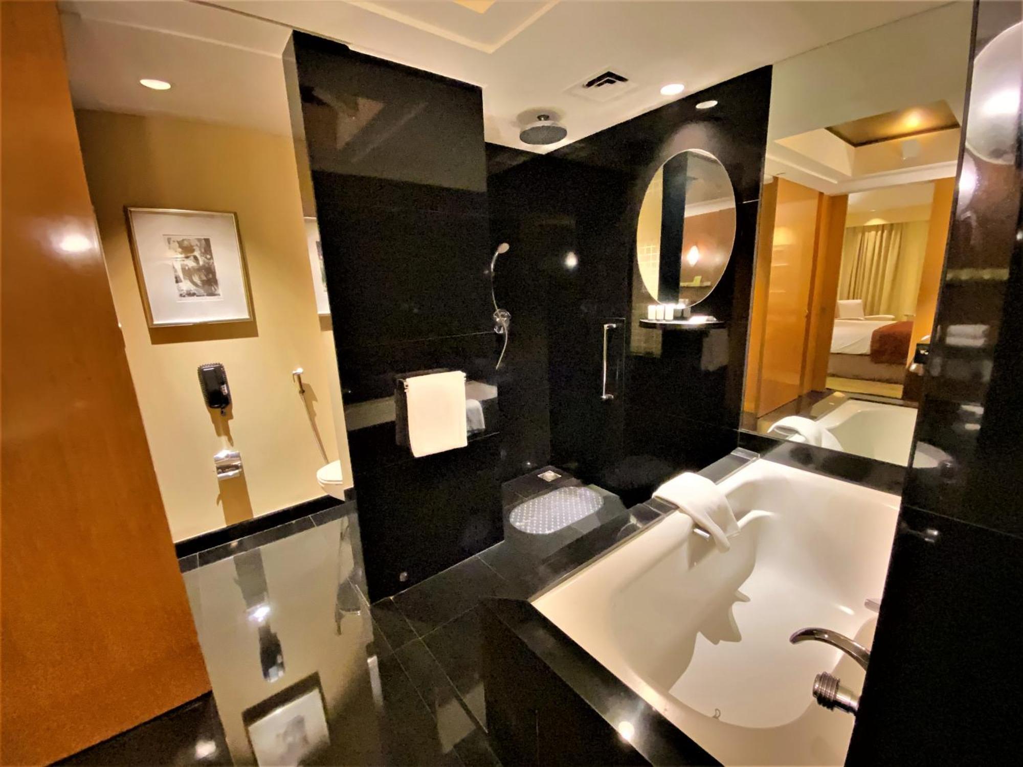 The Grand Deluxe Room King Bed on session of 30 mins Spa on food & soft beverage services on Laundry service T&C applicable