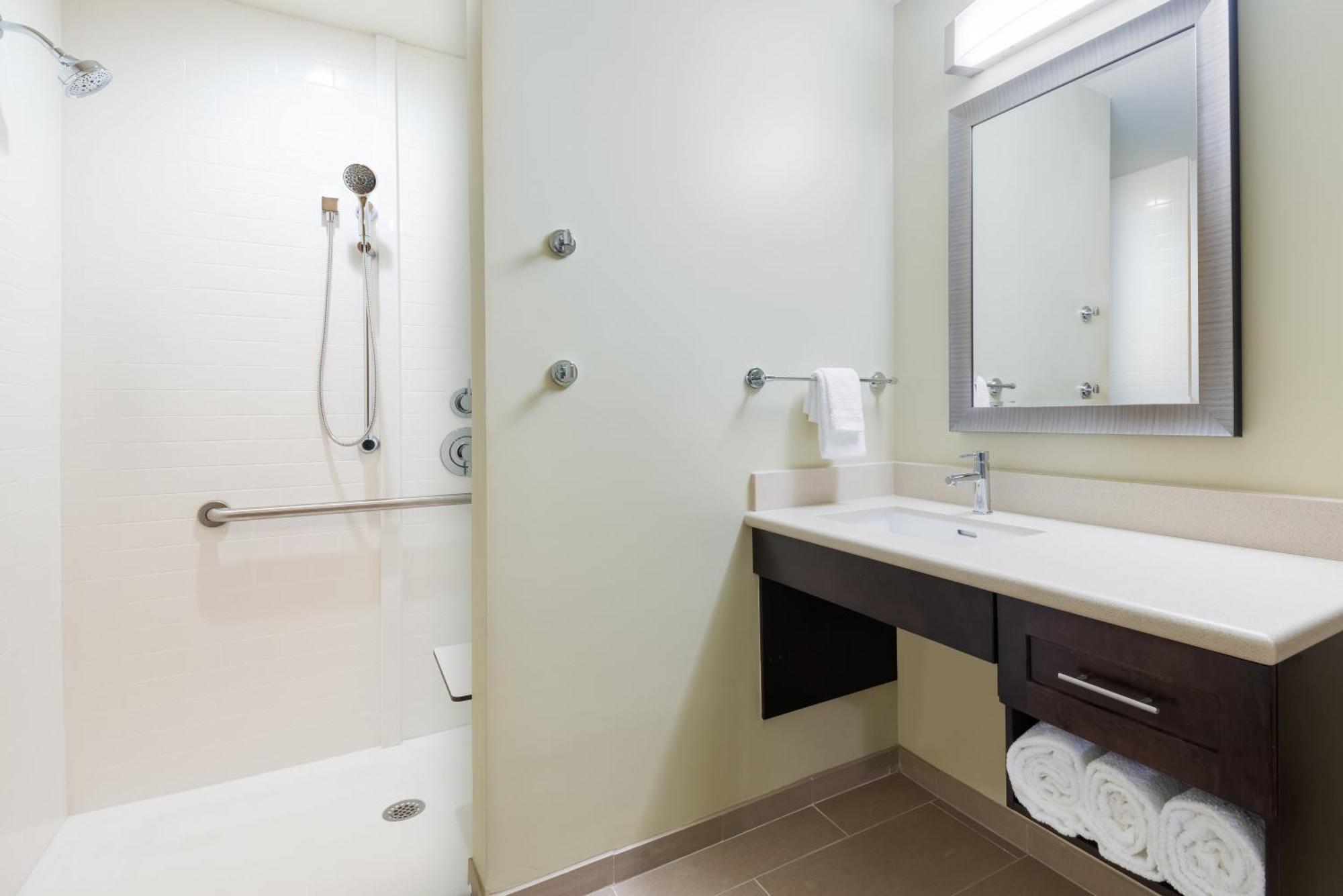 Queen Studio Suite Roll Shower Communications Accessible