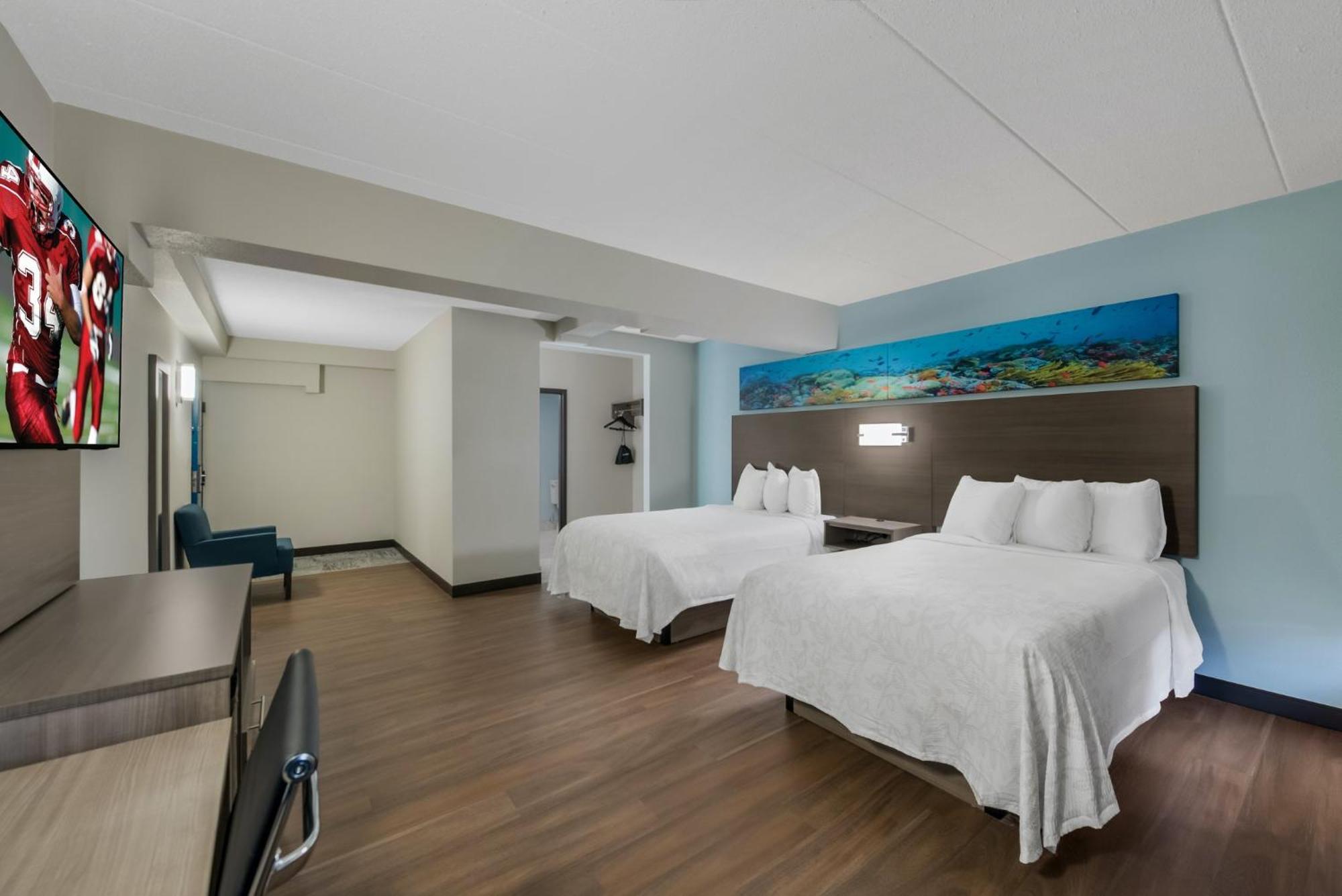 Premium Two Double Beds Partial Ocean View Smoke Upgraded Bedding