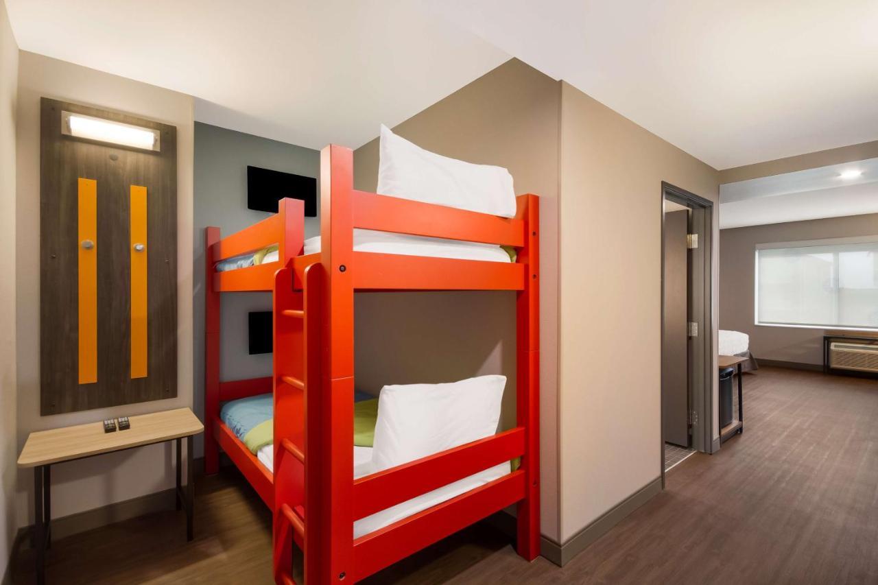 Mobility Accessible Room One King Two Twin Beds