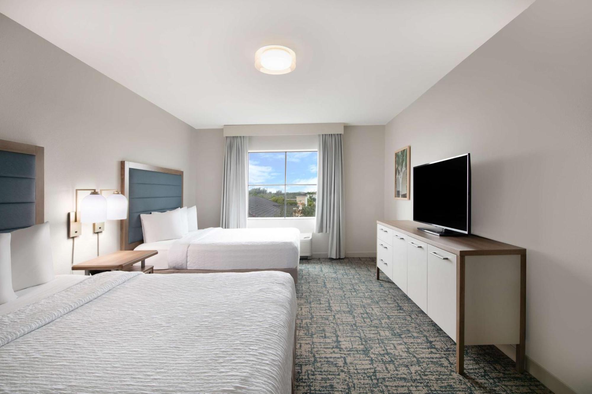 Two Bedroom Suite One King Two Queen Beds