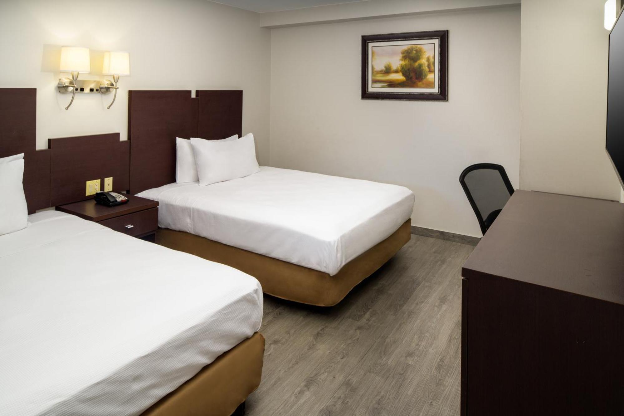 Queen Room Two Queen Beds Smoking