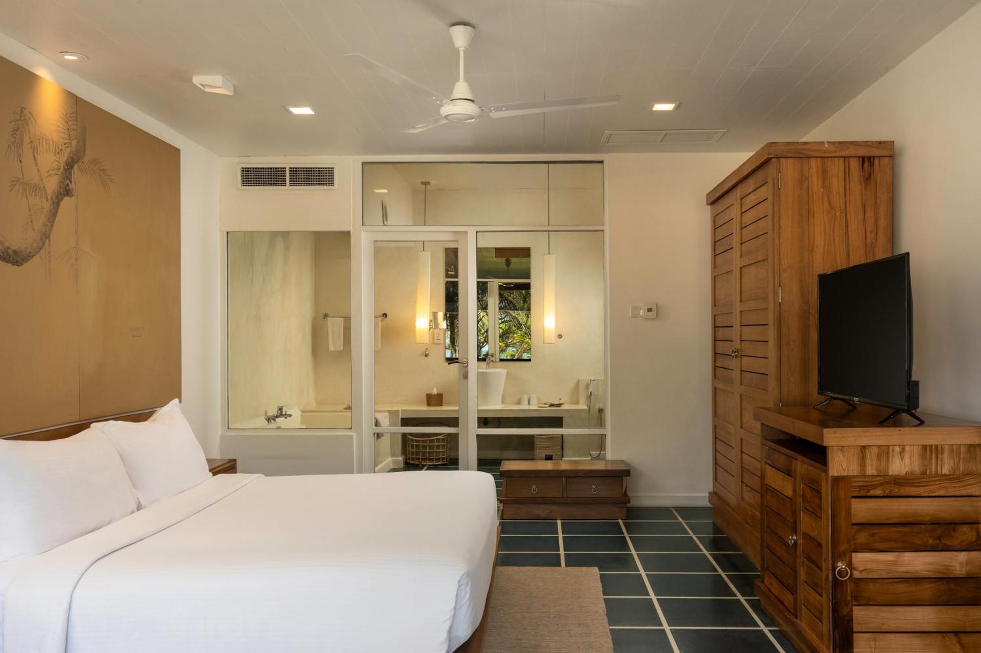 Family Room Sea View at Center Point Black Coral & at Seaside Social restaurants