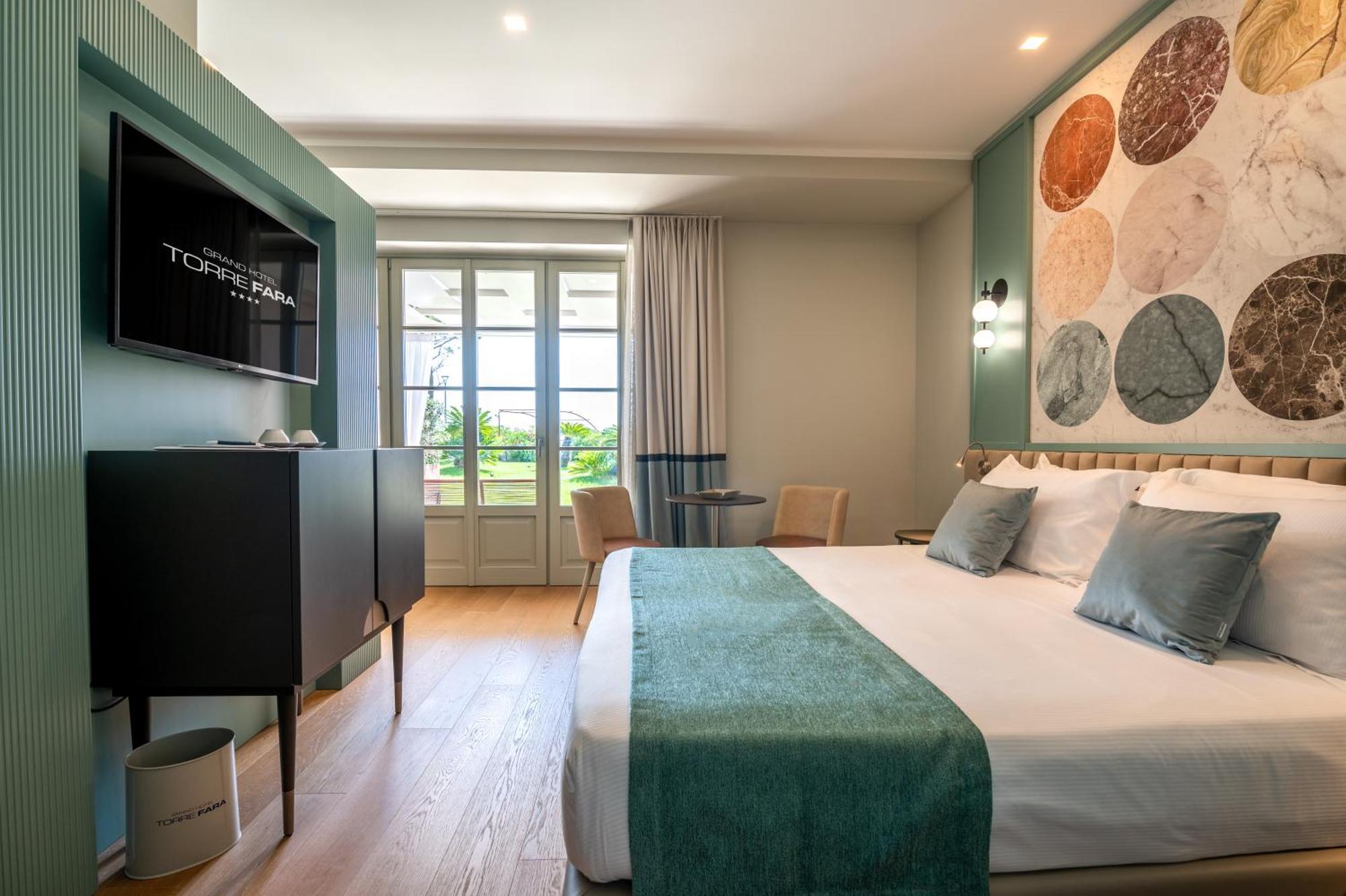 Deluxe Double Room Patio Side Sea View