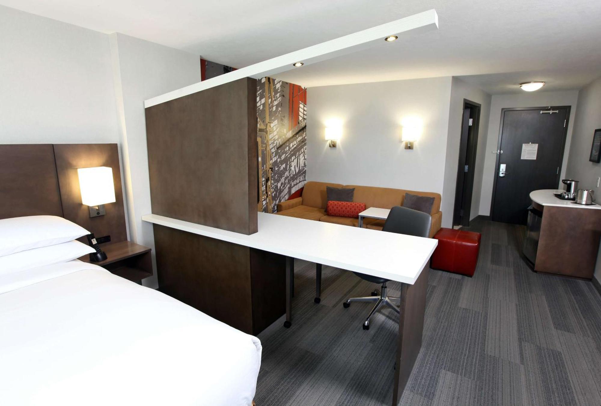 King Room with Sofa Bed and Roll-In Shower - Mobility and Hearing Access