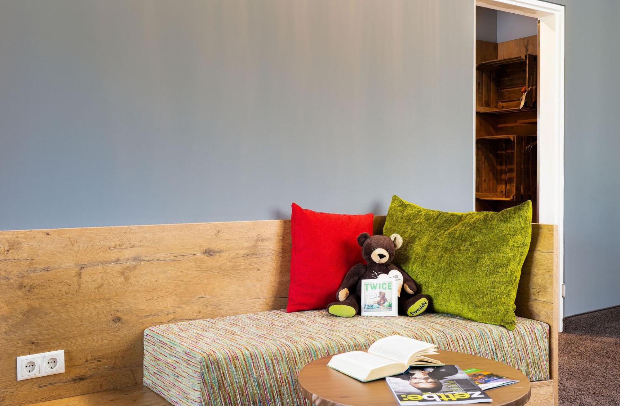 Doppelzimmer „Comfy Maxy" zum Teil mit Balkon