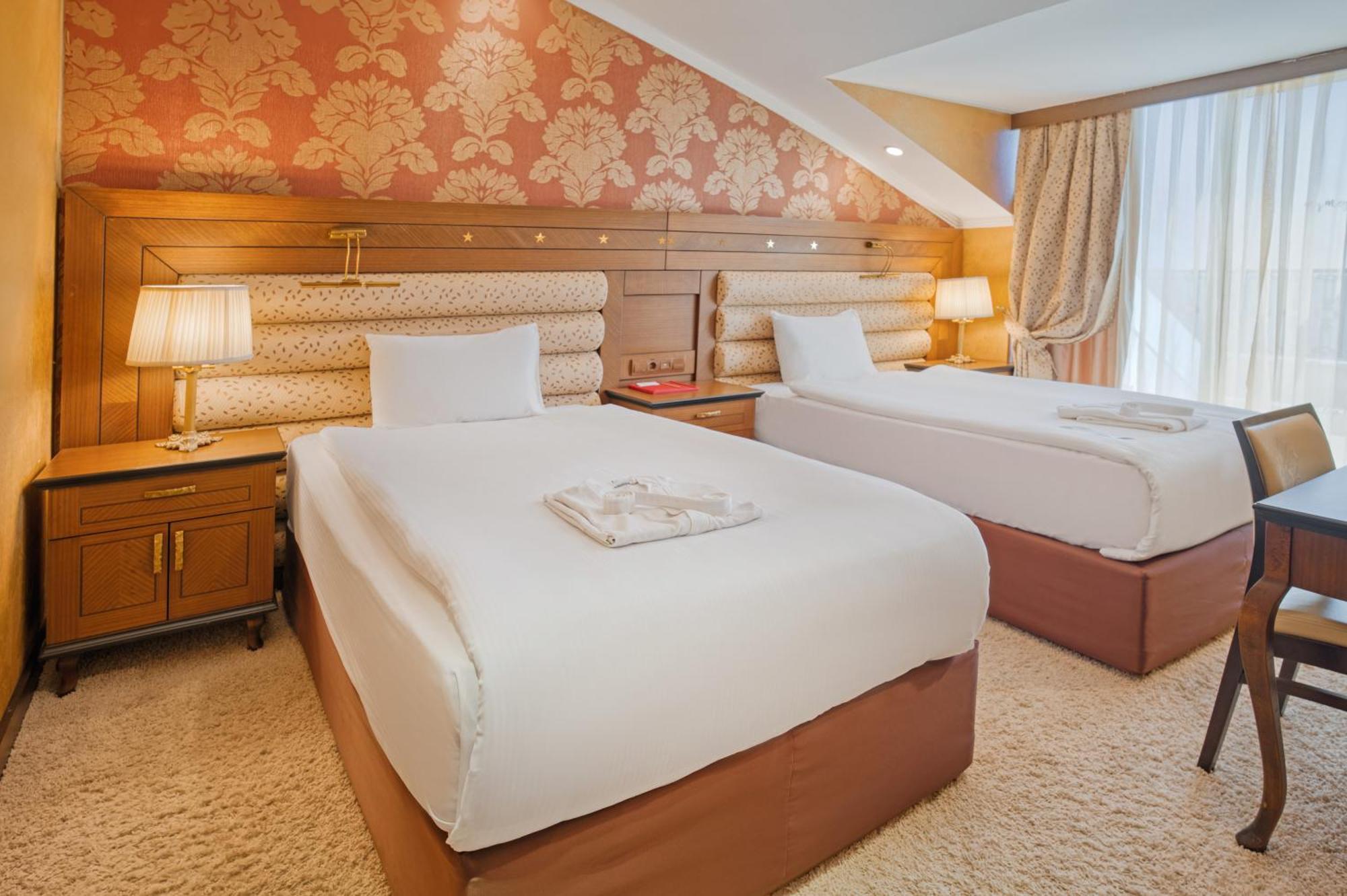 Suite met Kingsize Bed en Uitzicht op Zee