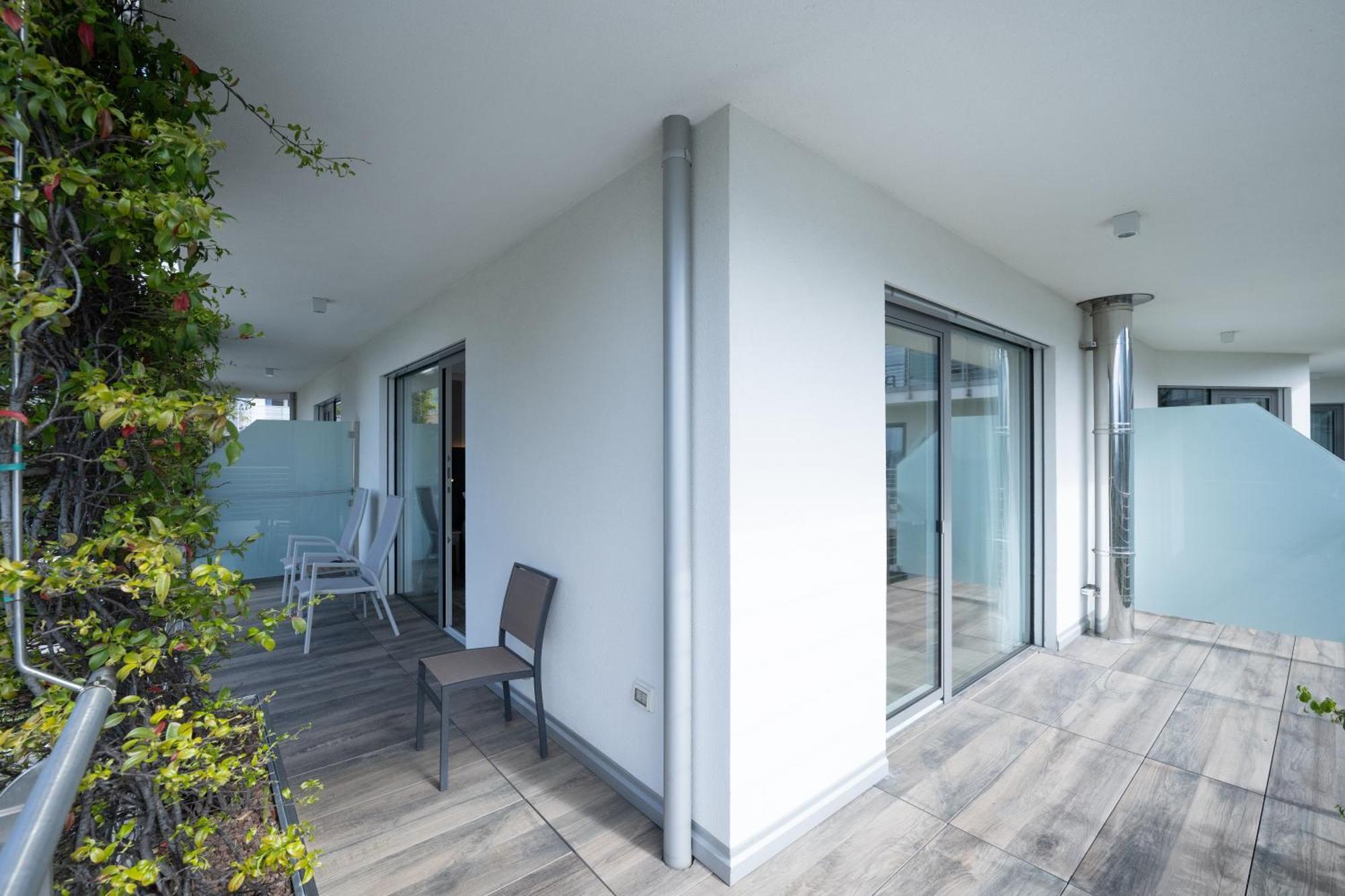 Deluxe Triple Room Lake View Double Balcony