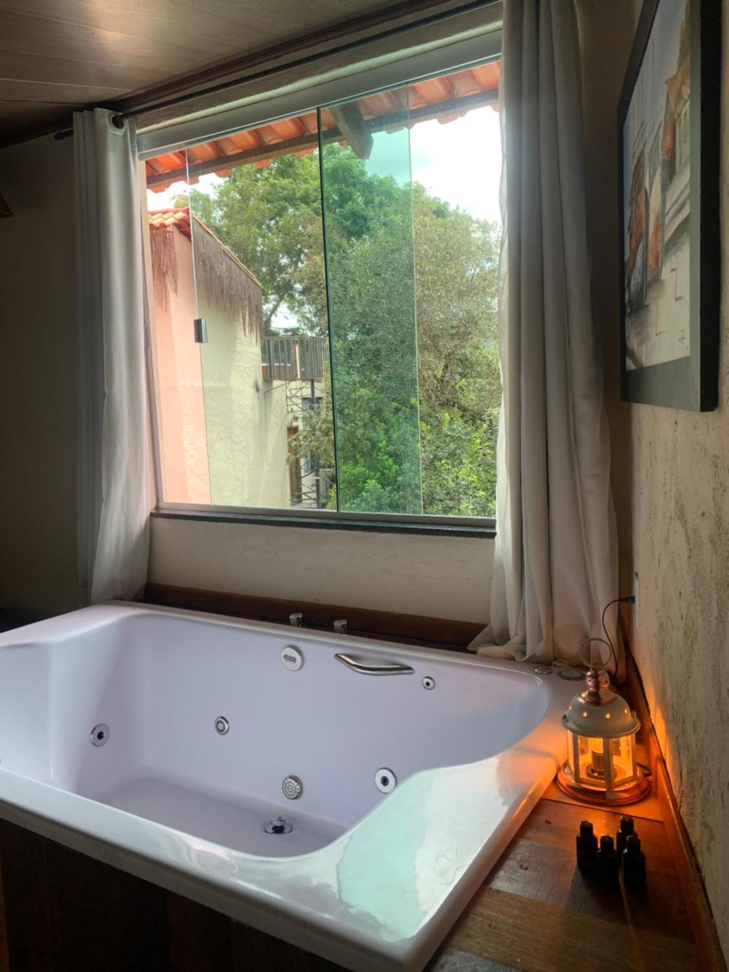 Suíte com Vista para a Piscina