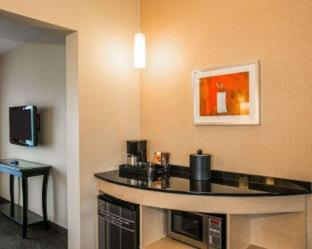 One King Bed One-Bedroom Accessible Corner Suite Non-Smoking