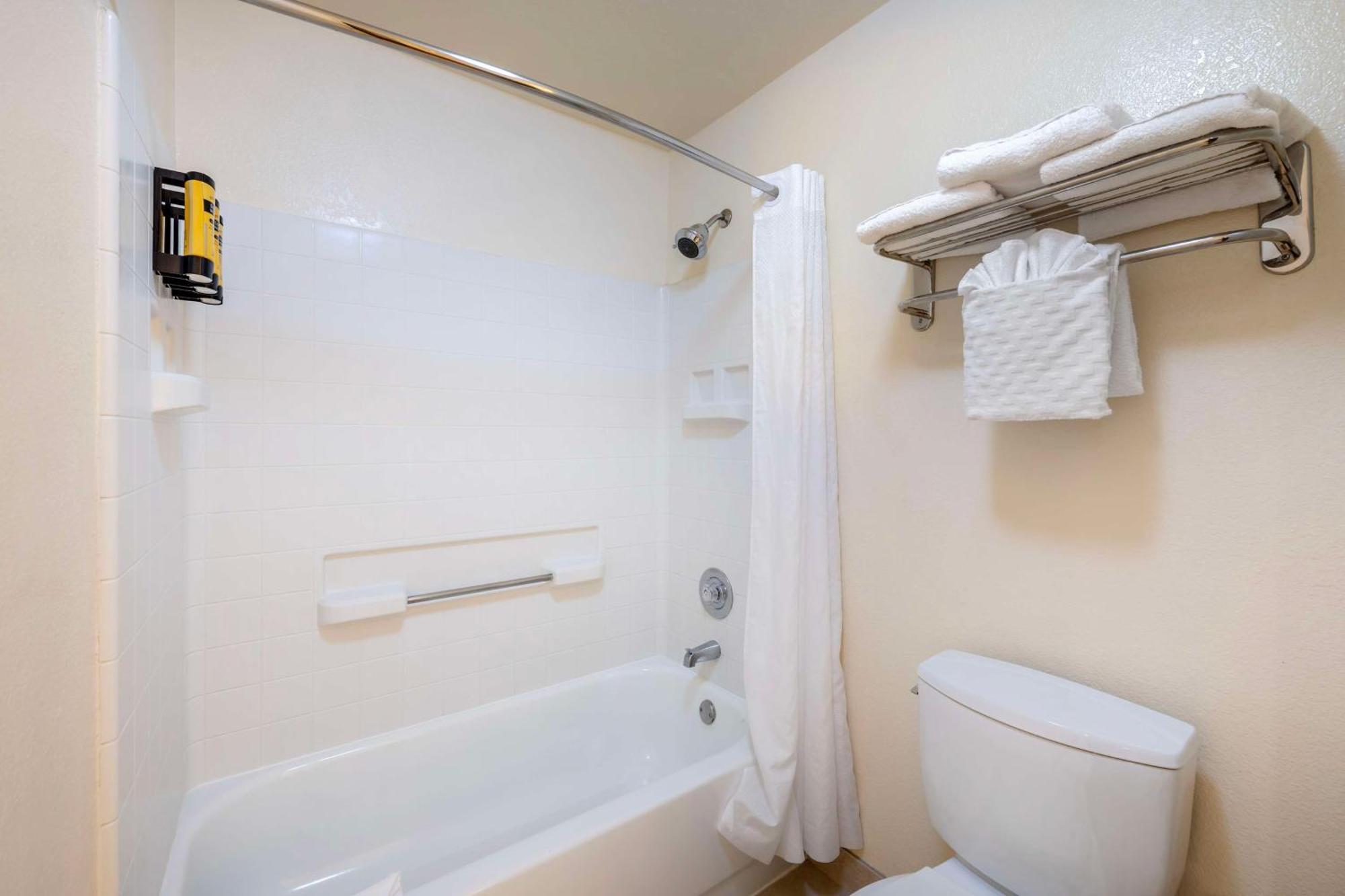 Suite Two Double Beds Sofa Bed Pool View or Non-Smoking