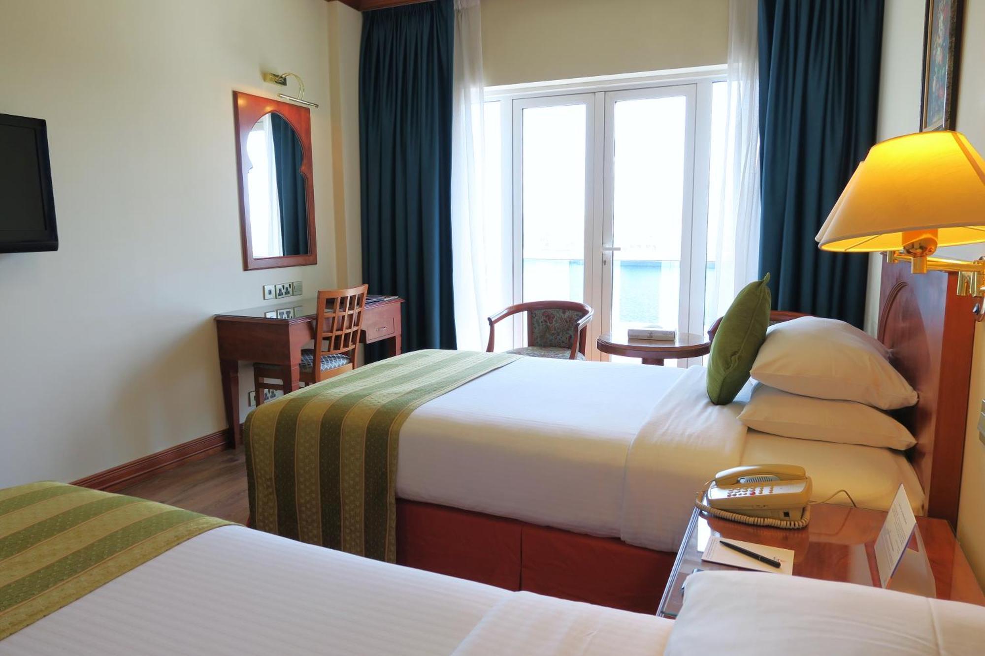 Standard Twin bed-Creek View Balcony