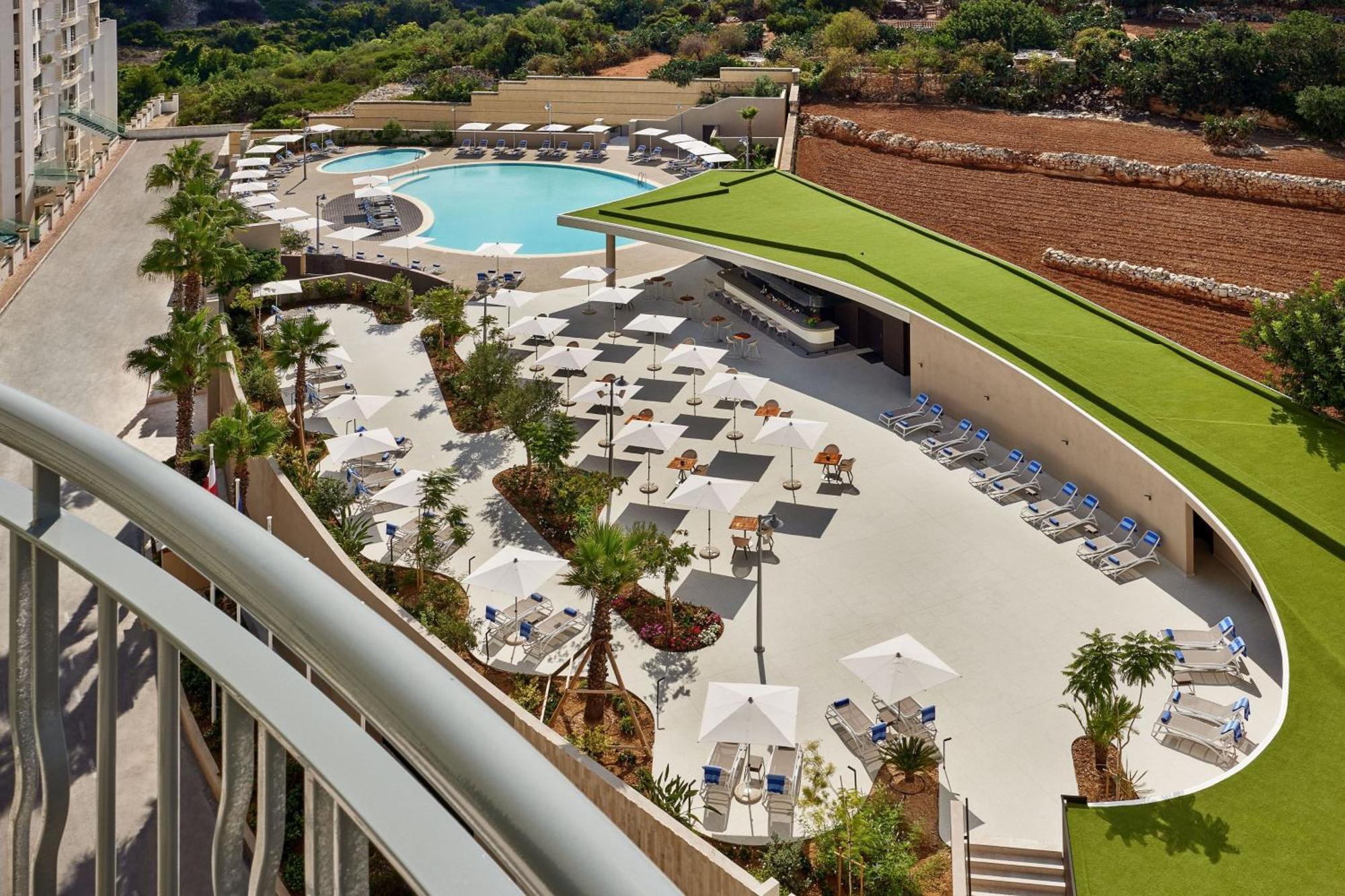 Deluxe Pool View Room 1 King Bed Balcony