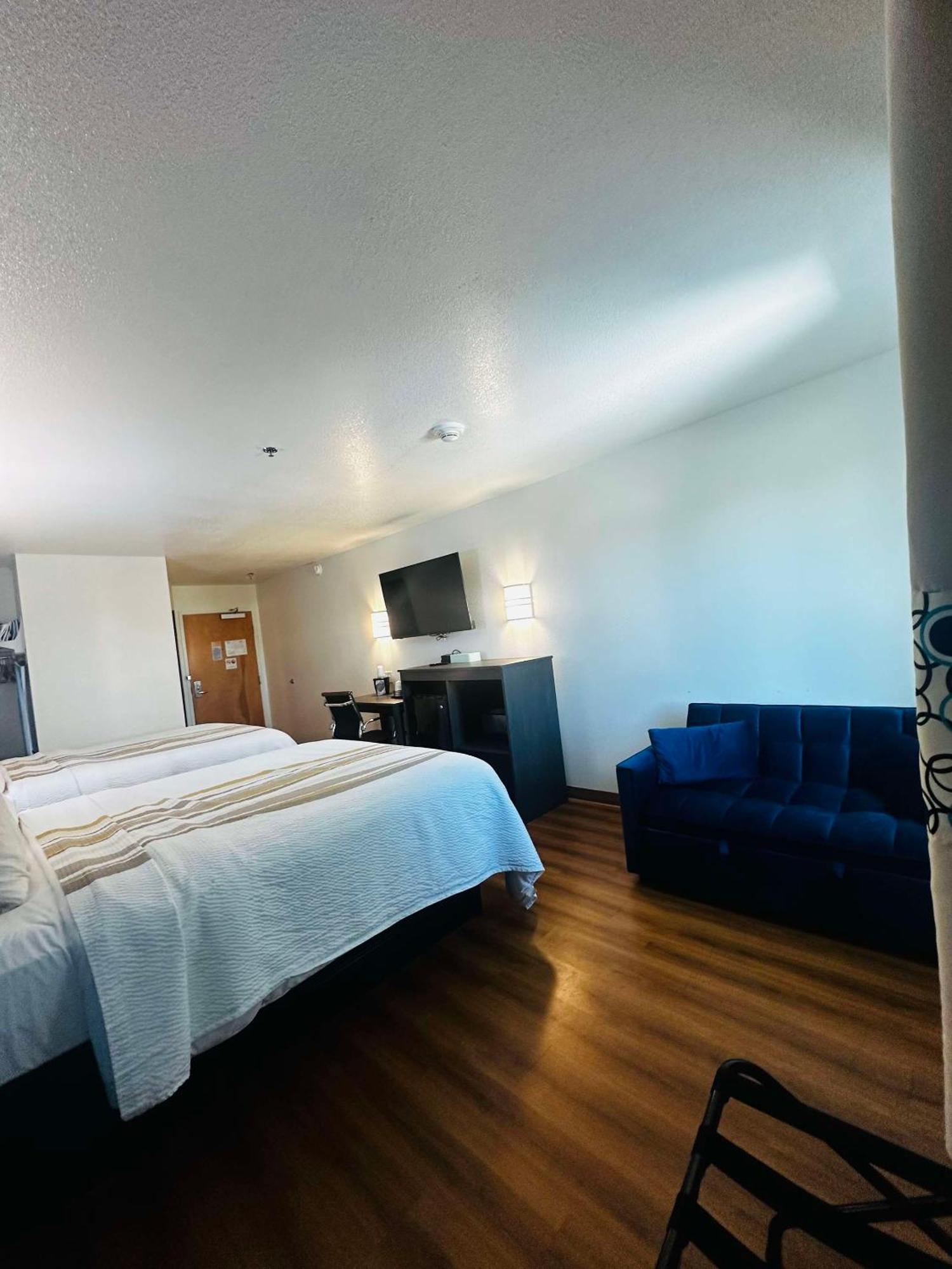 Queen Room with Two Queen Beds with Sofa Bed