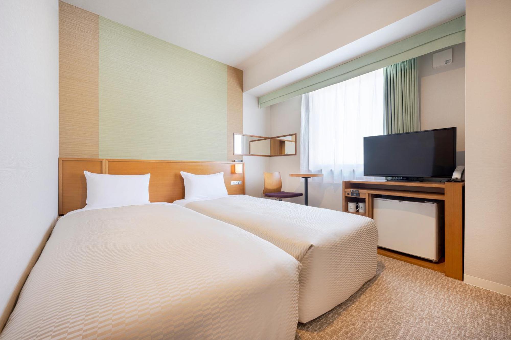Quarto com 2 Camas de Solteiro Hollywood - Não Fumantes