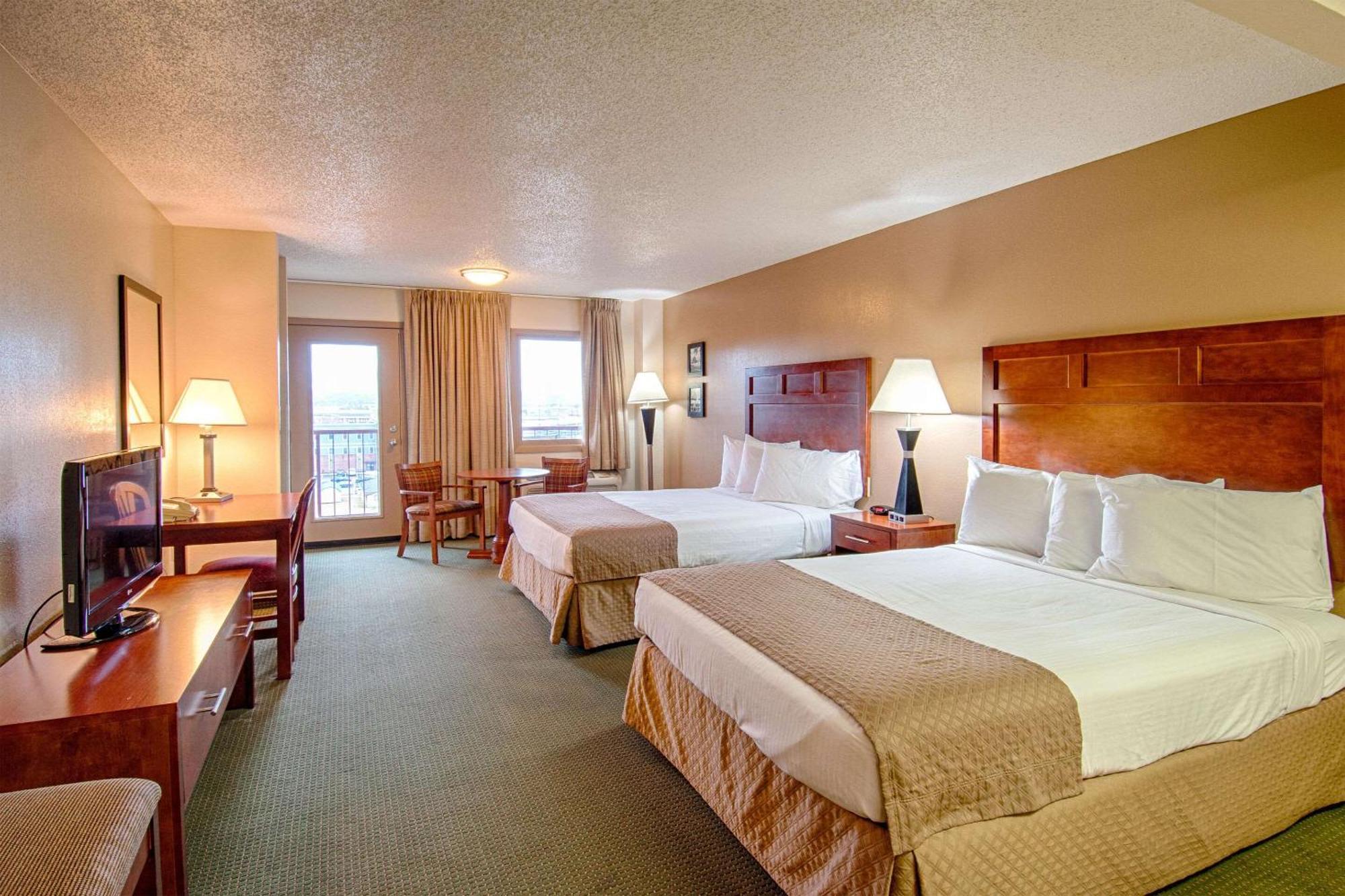 Quadruple Room Two Queen Beds Balcony Non Smoking or Interior Corridor