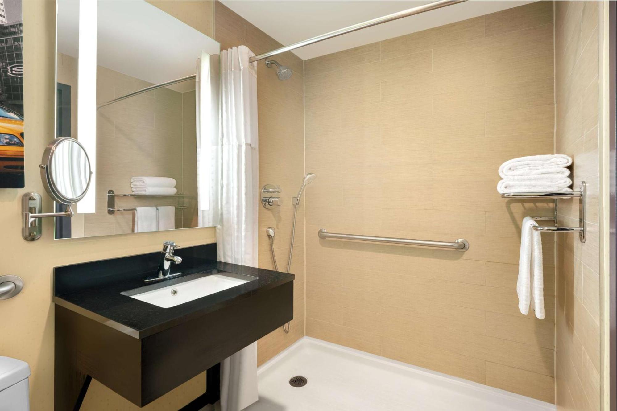 Queen Room Roll Shower Mobility Accessible or Non-Smoking