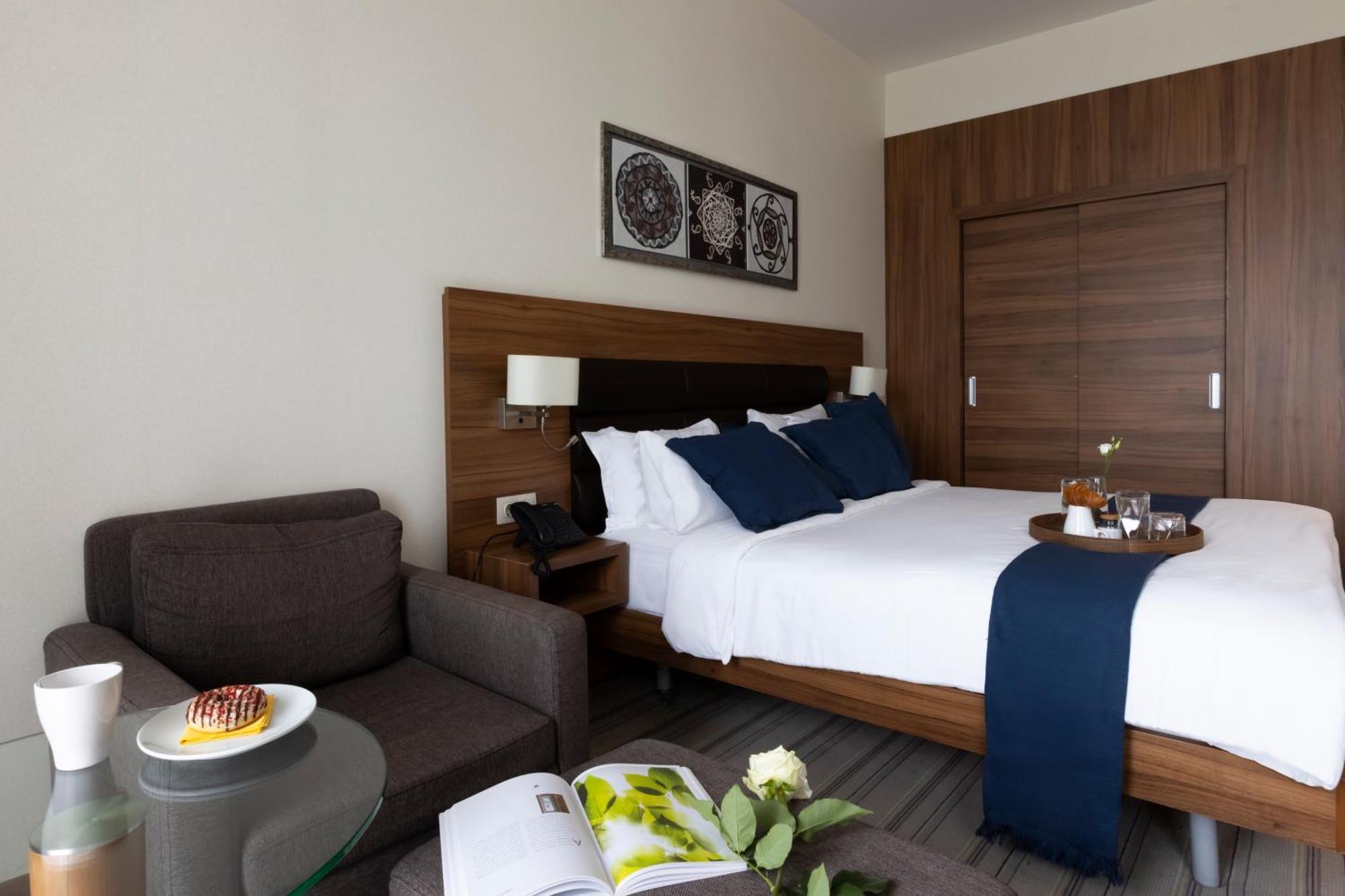 Premier King Room Complimentary Water WiFi Tea Coffee Equipment
