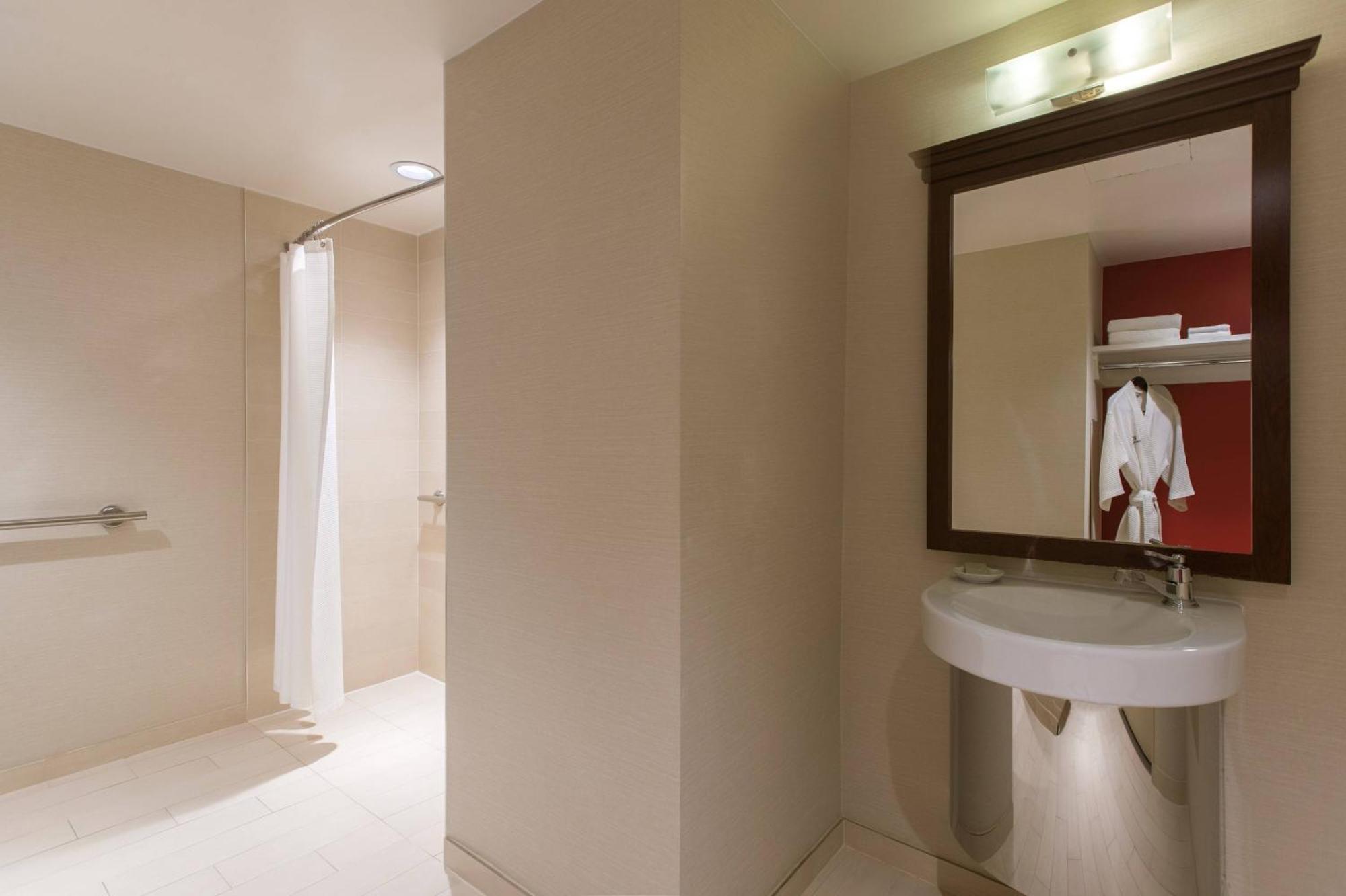 King Room Adapted Tub Atrium View Mobility Hearing Accessible