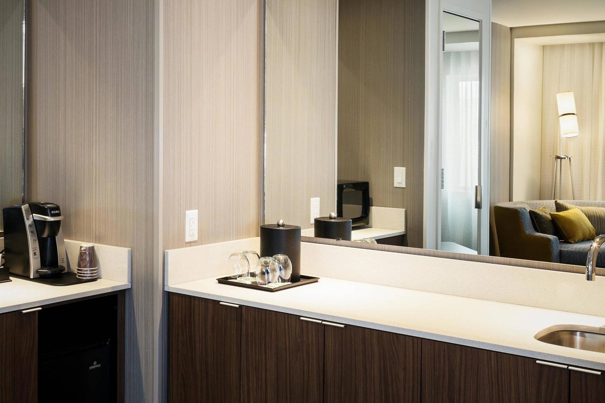 One-Bedroom King Suite with Roll-In Shower and Sofa Bed - Mobility Access/Hearing Accessible