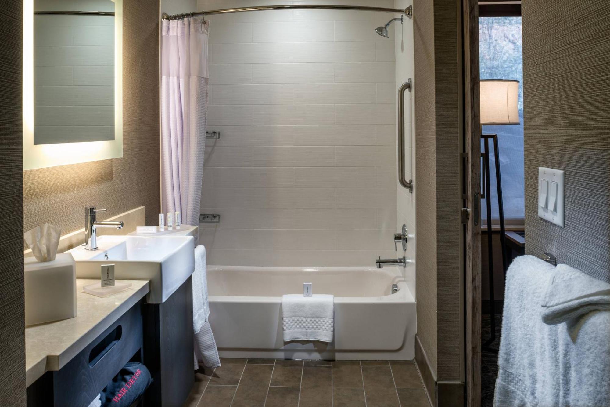 Queen Suite Two Queen Beds Roll Shower Trundle Sofa Mobility Access or Hearing Accessible
