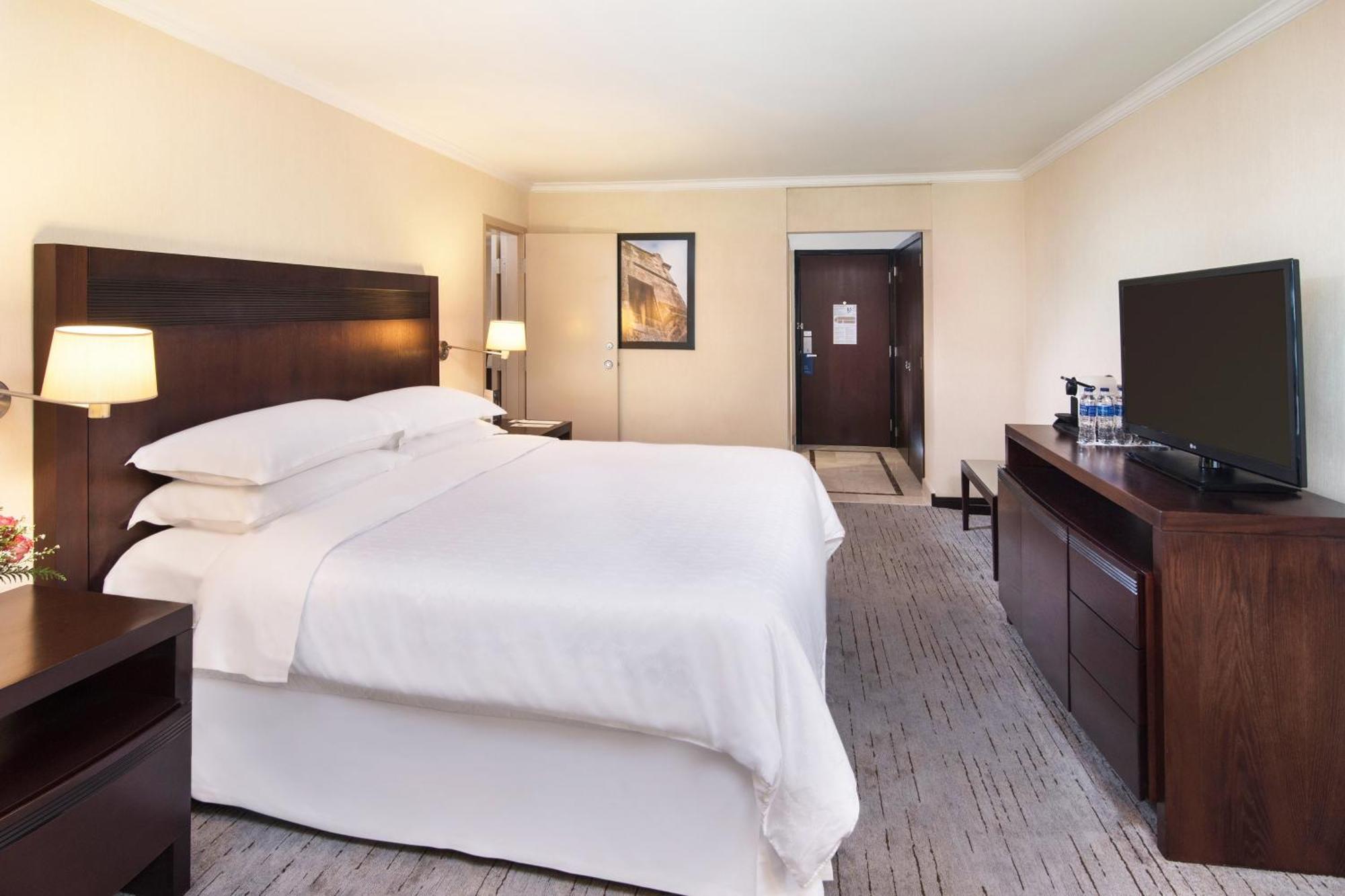 Larger Guest room 1 King Partial ocean view