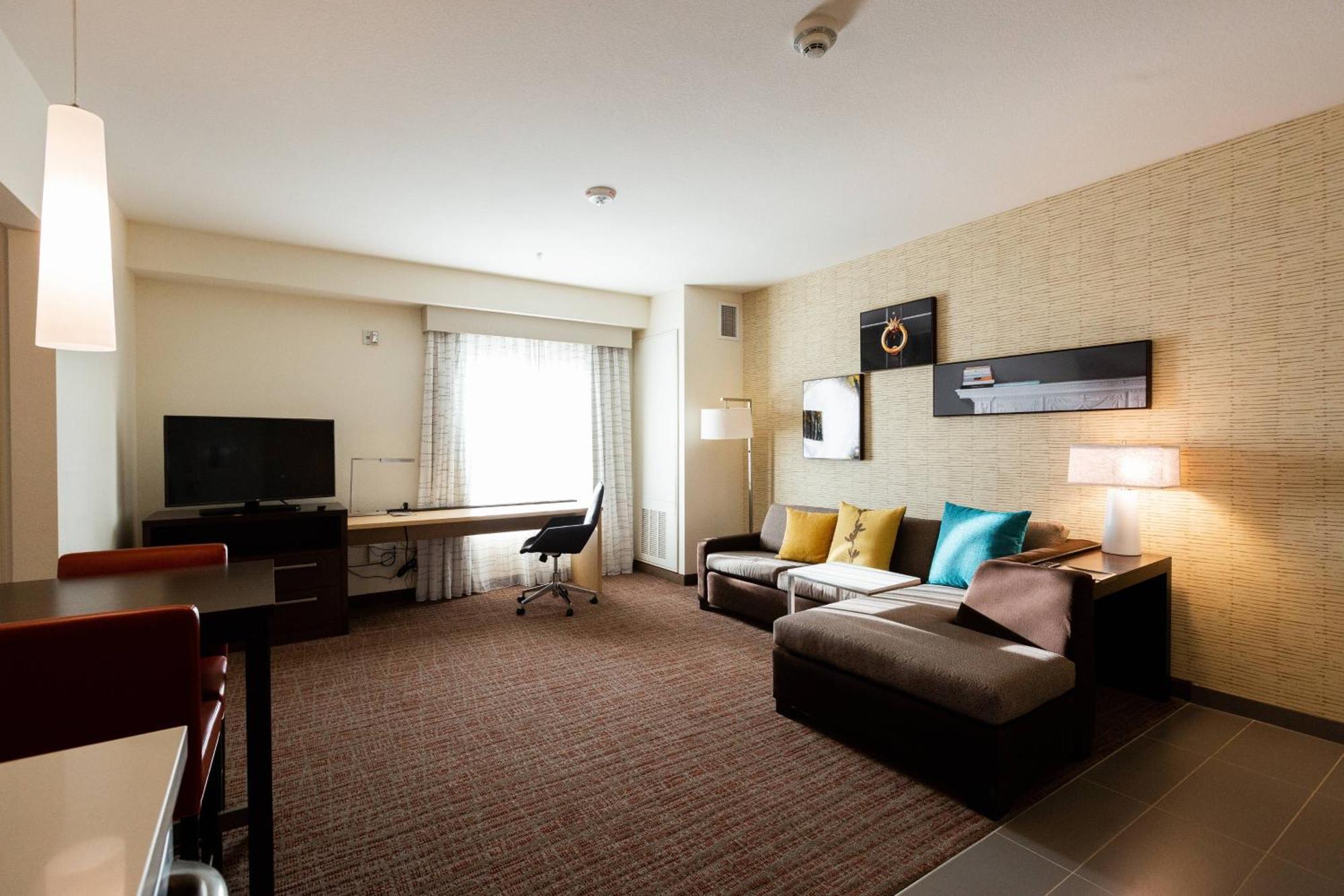 One-Bedroom King Suite Sofa Bed Adapted Tub Mobility Hearing Accessible,1637746503:JPEG