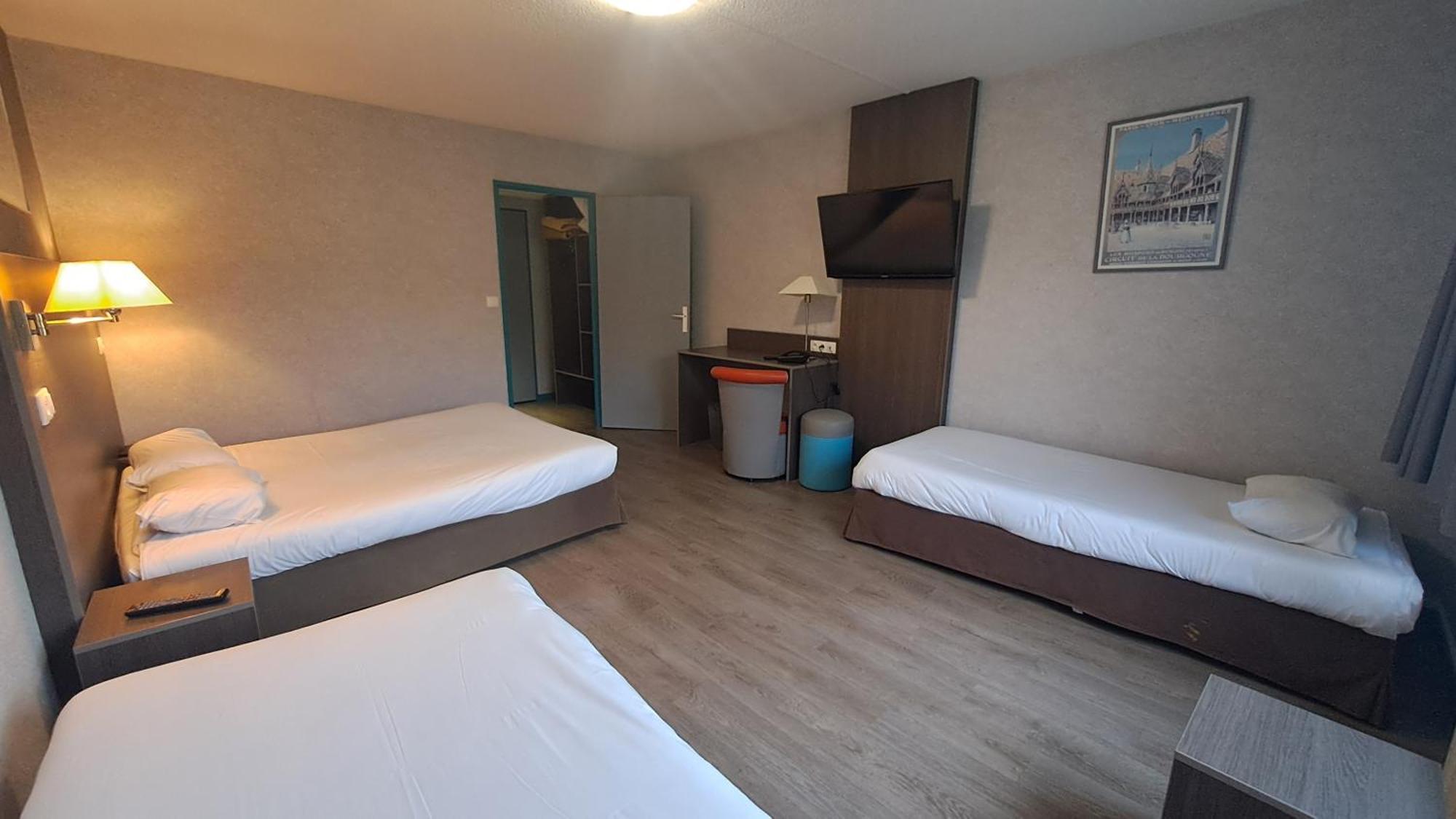 Quadruple Room 1 Double Bed 2 Single Beds