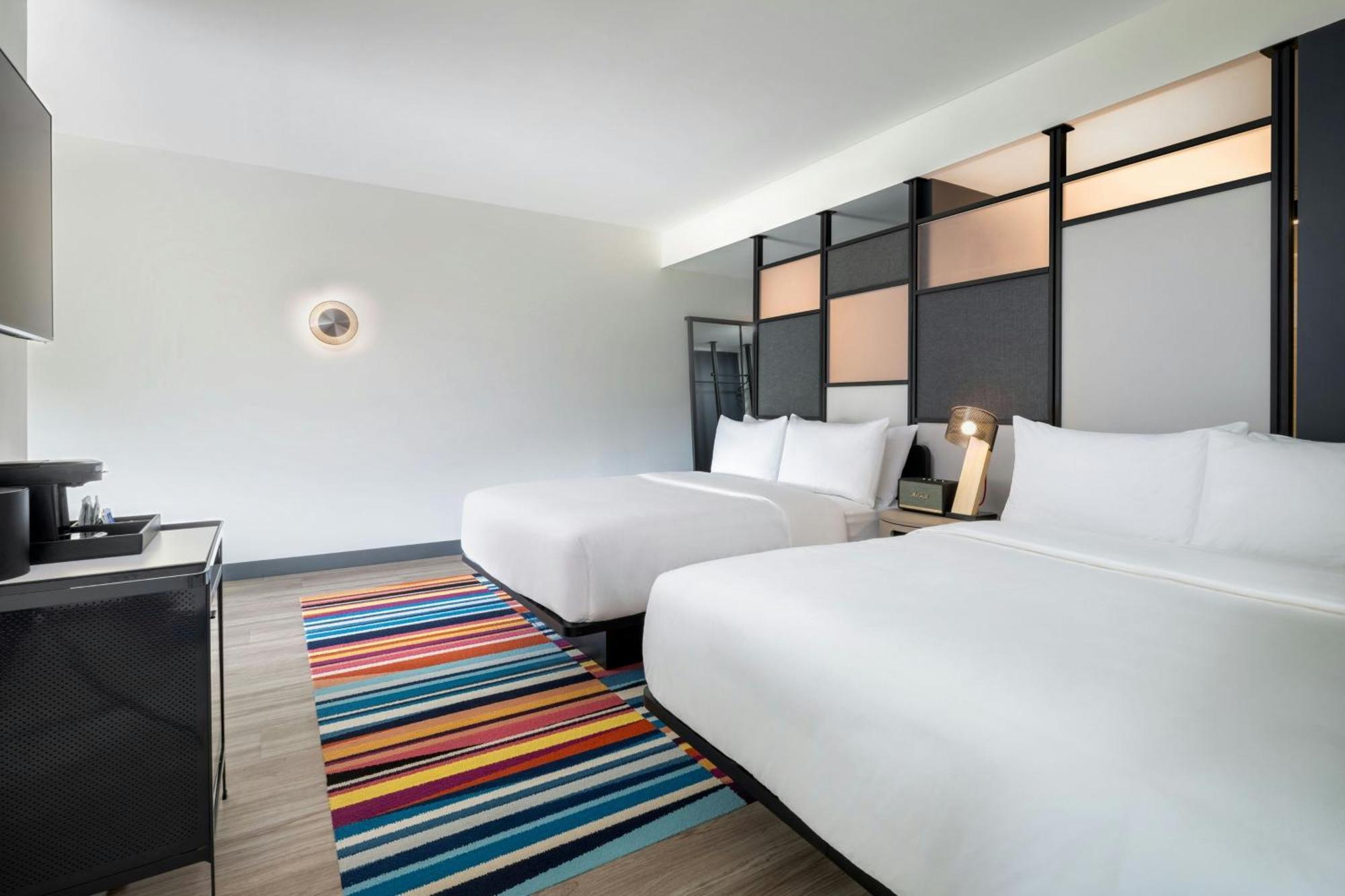 Suite with Two Queen Beds and Sofa Bed