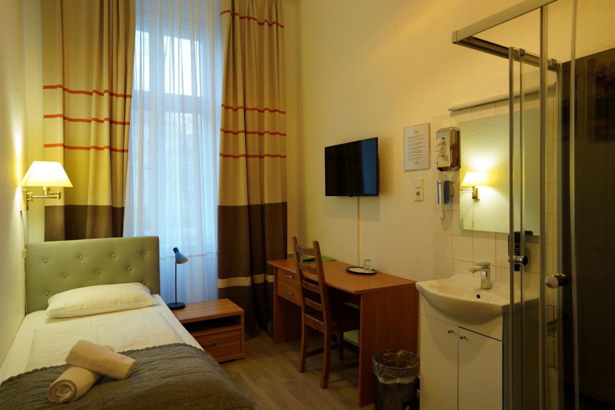 Single Room Private Shower Shared Toilet