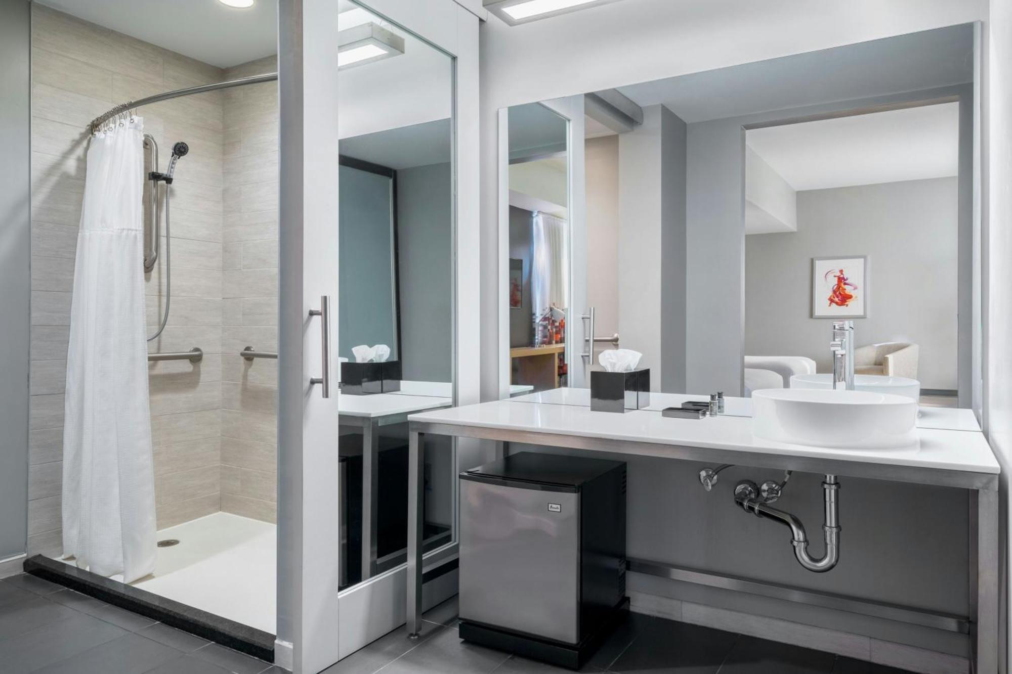 Corner Queen Room with City View and Roll-In Shower - Mobility/Hearing Accessible