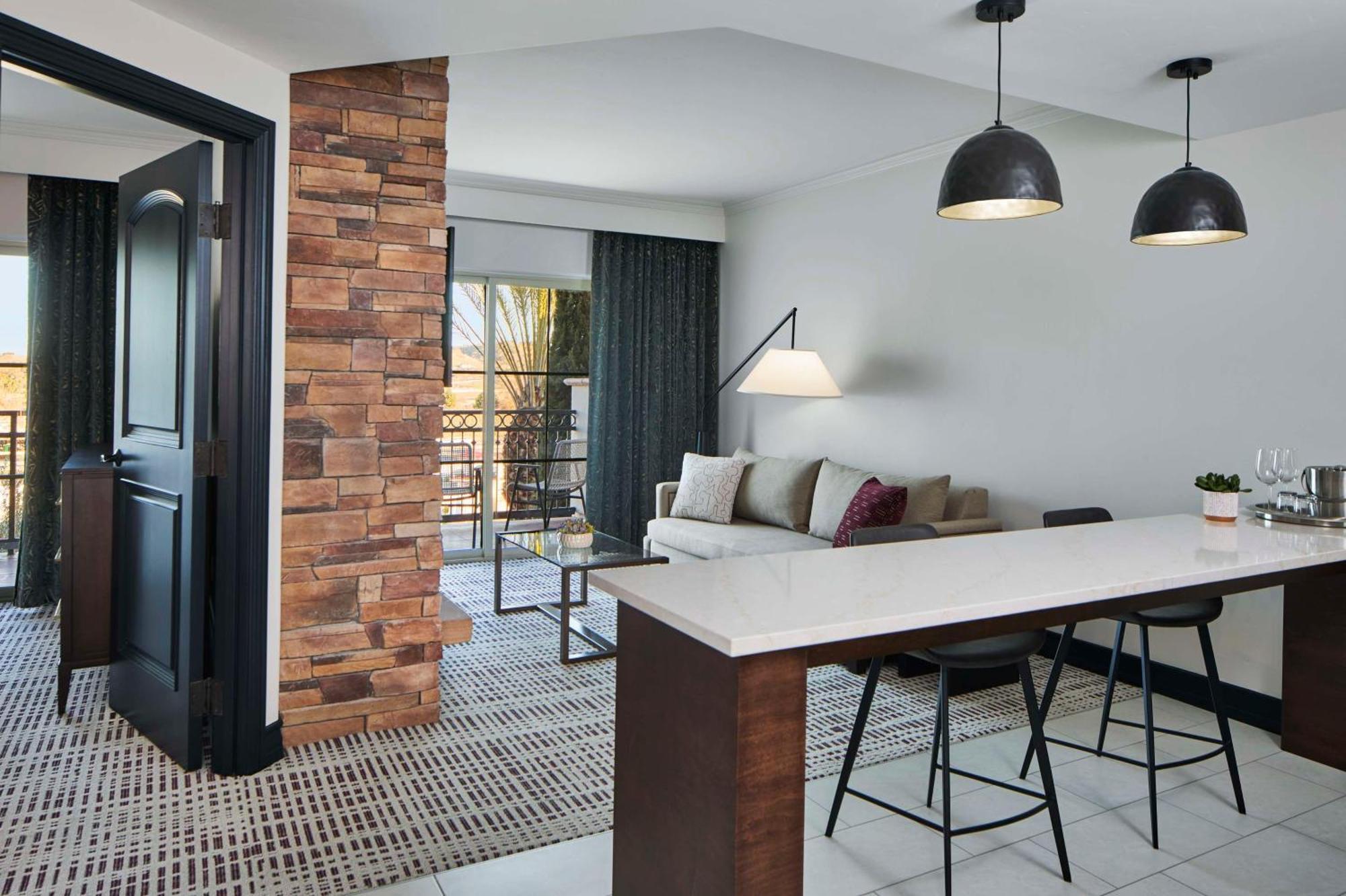 One-Bedroom King Suite Sofa Bed Balcony