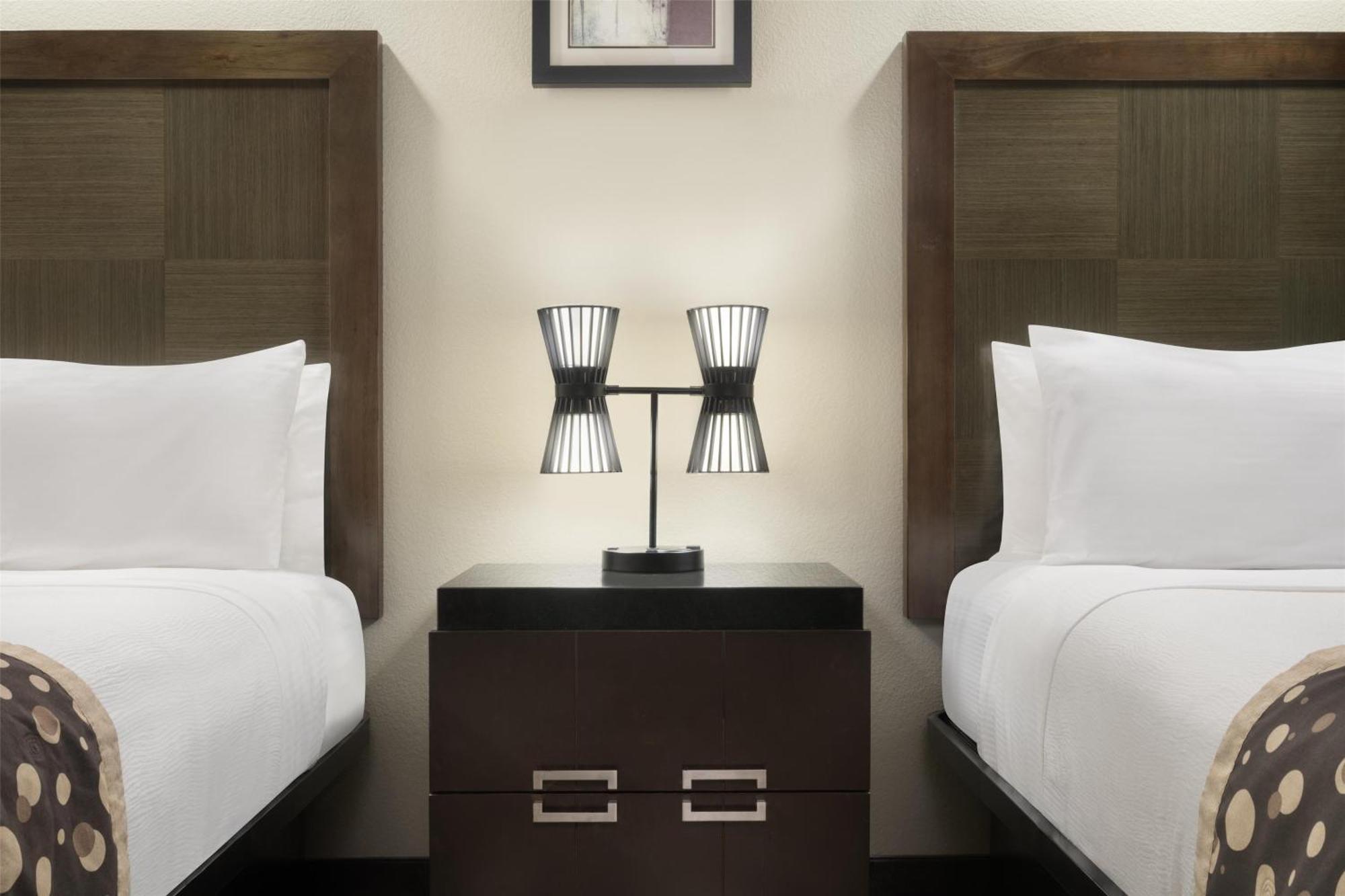 Queen Suite with Two Queen Beds with Sofa Bed