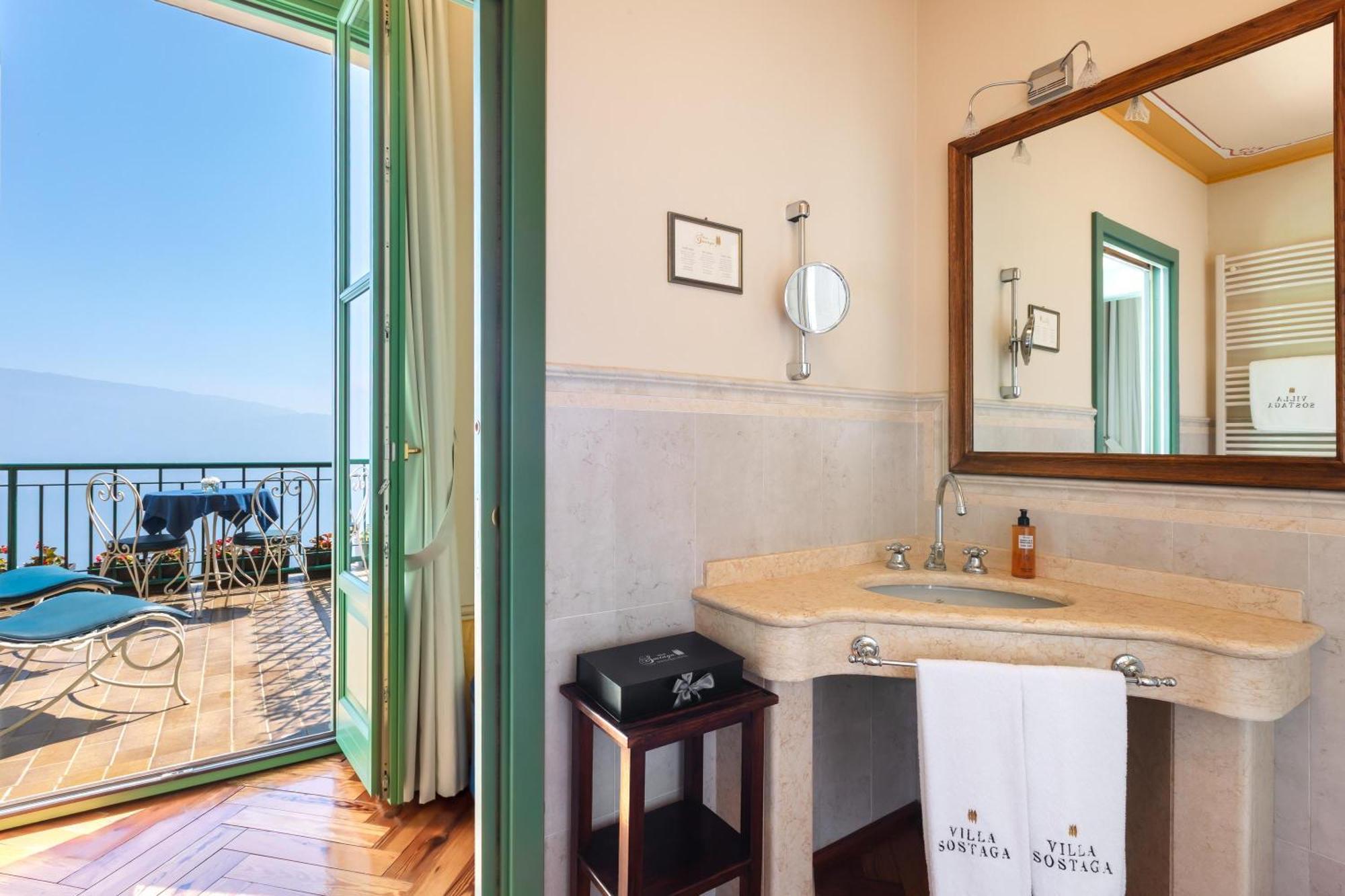 Junior Suite mit Terrasse und Seeblick - Villa