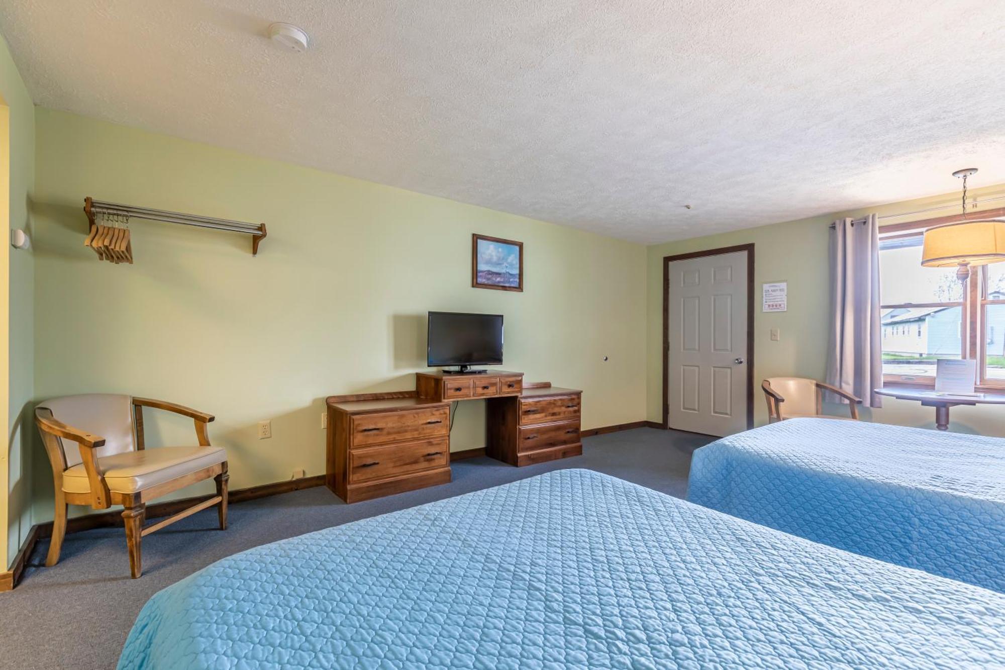 Motel Room Two Double Beds Air Conditioning no pets no smoking,1673956761:JPEG